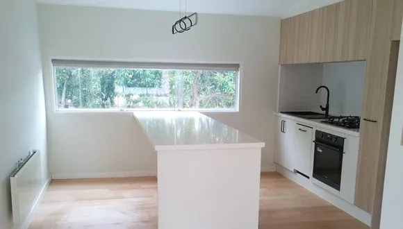 Clean, empty fitted kitchen